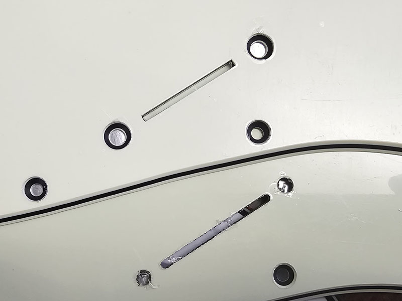 Fender Strat Switch slot with and without countersunk holes