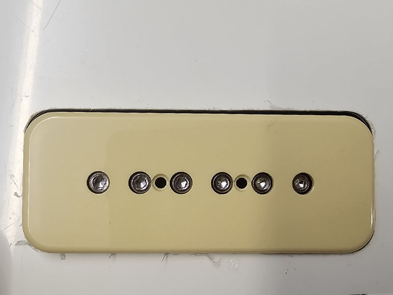 Gibson P90 in Epiphone Route showing difference in size