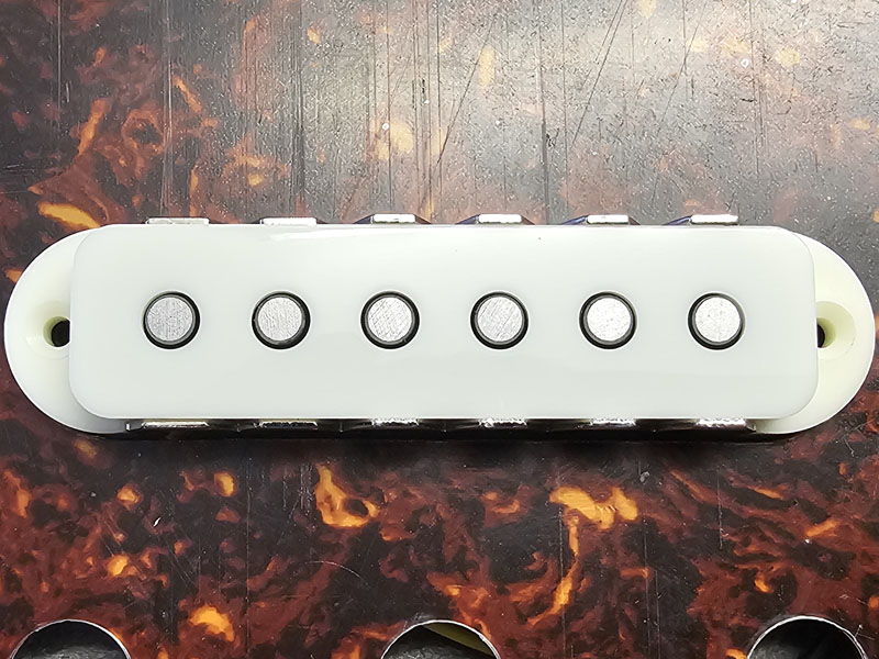 Jaguar pickup mounted into a tortoise shell plate