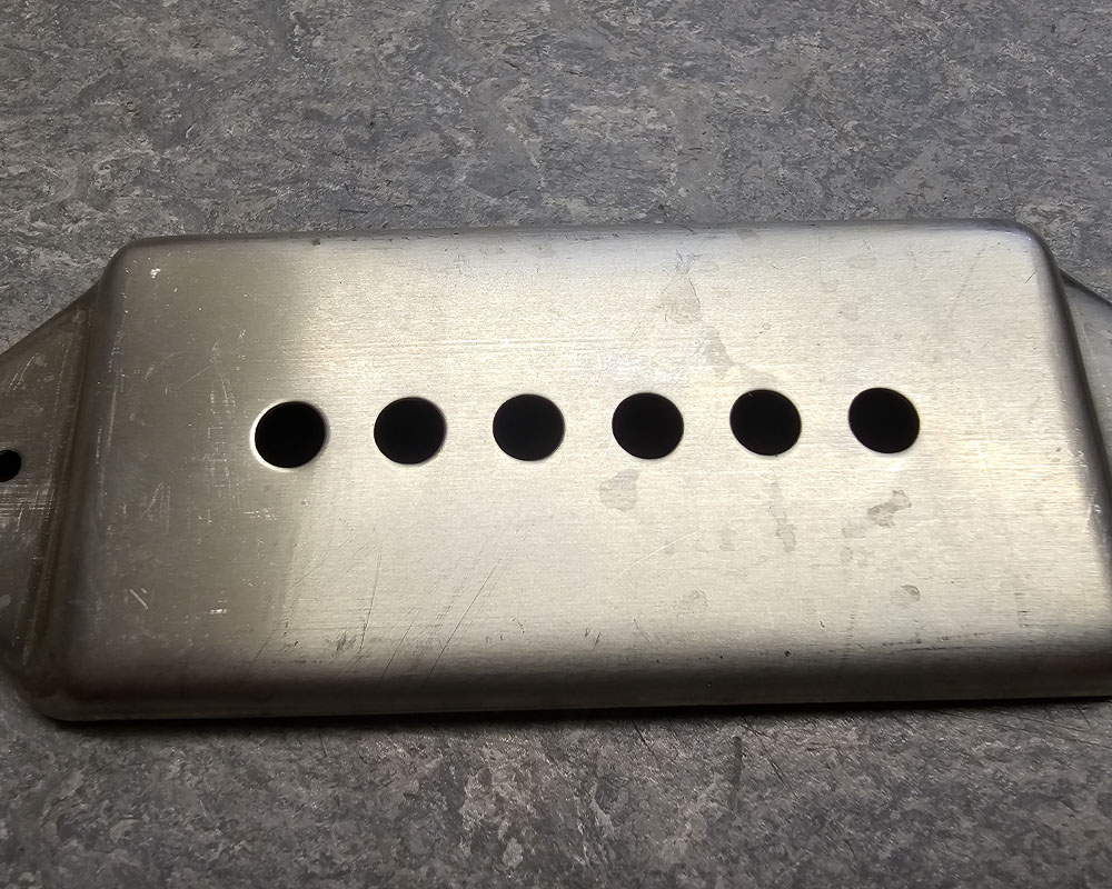 A Raw Nickel Epiphone Casino Cover
