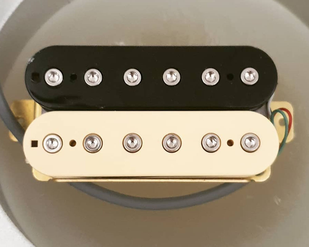 Black Covered Humbucker with Gold Poles